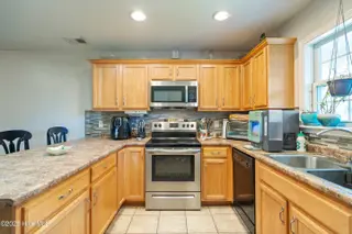 1961 Gastonia Road, Southport, NC 28461 — 3-bedroom home in Boiling Spring Lakes, Southport, NC, photo 13 of 25: Kitchen 1