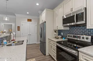 161 NE 31st Street, Oak Island, NC 28465 – photo 22: 26-web-or-mls-DSC04157