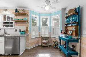 124 NE 15th Street, Oak Island, NC 28465 – photo 9: thumbnail-0196a7bd-054b-71d3-b8f1-393759