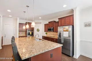 530 Avenue Of The Carolinas, Carthage, NC 28327 – photo 16: Kitchen with Stainless Steel Appliances