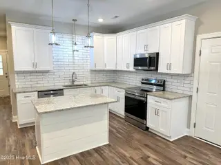 321 NE 52nd Street, Oak Island, NC 28465 – photo 15: IMG_4519