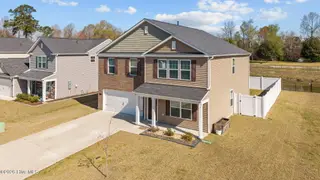 1917 Rolling Meadows Drive, Greenville, NC 27858 – photo 4: 4-web-or-mls-DJI_20260319104754_0669_D