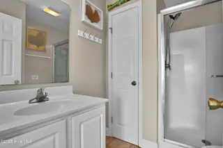 600-A N Anderson Boulevard, Topsail Beach, NC 28445 – photo 19: Primary Bedroom, Top Floor