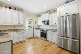 101 NE 33rd Street, Oak Island, NC 28465 – photo 13: Kitchen View 1
