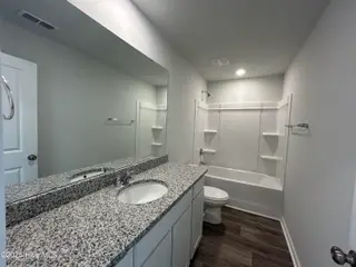 564 Coronado Avenue SE 15, Leland, NC 28451 – photo 20: Upstairs Bathroom with Bathtub