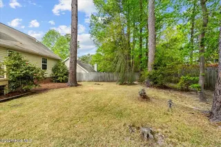 118 Kensington Way, Aberdeen, NC 28315 – photo 20: 118 Ken side view yard