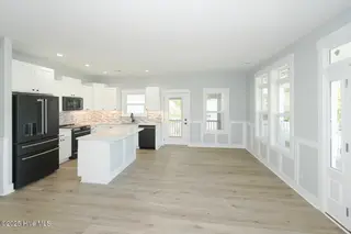 104 NE 52nd Street, Oak Island, NC 28465 – photo 5: 104 NE 52nd St Oak Island NC-large-006-0