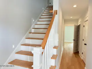 116 Hardwick Lane, Newport, NC 28570 – photo 11: Bottom Level Hallway and Stairs