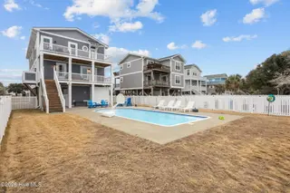 116 W Dolphin Drive, Oak Island, NC 28465 – photo 1: 54-web-or-mls-IMG_4378
