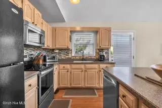 6707 Kings Lynn Drive, Oak Island, NC 28465 – photo 8: 6707 kit 2