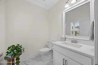 424 Northern Pintail Place, Hampstead, NC 28443 — 4-bedroom home in Magnolia Reserve, Hampstead, NC, photo 13 of 68: 8_bathroom