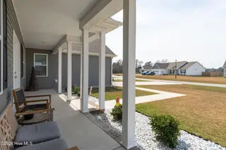 610 Bright Harvest Drive, Maysville, NC 28555 – photo 5: Covered Front Porch Length