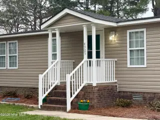 4905 Hunting Ridge Road NW, Wilson, NC 27896 — 3-bedroom manufactured home in Windemere, Wilson, NC, photo 2 of 16: Front of Home