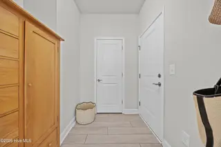 3205 Laughing Gull Terrace, Wilmington, NC 28412 — 2-bedroom home in Riverlights - Del Webb, Wilmington, NC, photo 24 of 60: 14_hallway