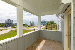 139 Sound Point Drive, Harkers Island, NC 28531 – photo 23: Deck off Principle bedroom