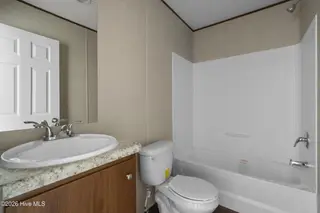 580 S Windward Drive SW, Supply, NC 28462 – photo 22: Guest Bathroom