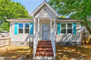 220 NE 33rd Street, Oak Island, NC 28465 – photo 1: 220 NE 33rd