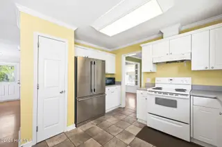 141 Crystal Road, Southport, NC 28461 — 3-bedroom home, Southport, NC, photo 13 of 40: 141 Crystal Rd Kitchen 2