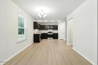 10696 Red Oak Boulevard, Nashville, NC 27856 – photo 11: 18-Living Room & Dining Area