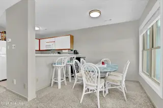 2105 Ocean Boulevard B, Topsail Beach, NC 28445 — 2-bedroom condo in Serenity Point, Topsail Beach, NC, photo 21 of 36: Dining Area