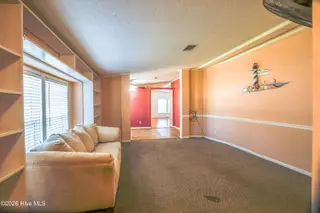 118 Woodland Drive, Swansboro, NC 28584 — 3-bedroom manufactured home in Hadnot Creek, Swansboro, NC, photo 5 of 16: Living room