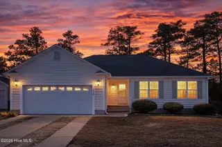 4998 N Hampton Drive SE, Southport, NC 28461 – photo 1: Front of house