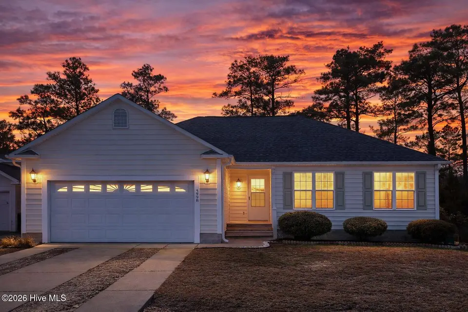 4998 N Hampton Drive SE, Southport, NC 28461 – photo 1 of 45: Front of house