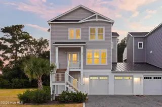 52 Pier View Court, Hampstead, NC 28443 — 3-bedroom waterfront home, Hampstead, NC, photo 2 of 60: 1_front center exterior sunsey