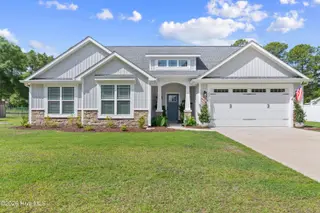 299 Boundaryline Drive NW, Calabash, NC 28467 – photo 2: Front Elevation