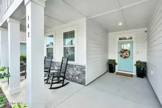 142 Rice Marsh Way, Wilmington, NC 28412 — 3-bedroom home in Bella Port, Wilmington, NC, photo 3 of 62: 142 RICE MARSH WAY - FRONT PORCH