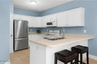 221 Palomino Lane, Swansboro, NC 28584 – photo 12: palomino_decluttered_kitchen_3