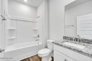 3217 Butterfly Ginger Street Lot 75, Leland, NC 28451 — 3-bedroom home in Indigo Preserve, Leland, NC, photo 24 of 49: 3192ButterflyGingerStreet-7