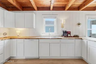 707 W Beach Drive, Oak Island, NC 28465 – photo 24: 15-Kitchen