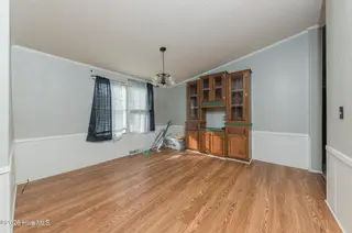 210 Creek Bank Drive, New Bern, NC 28560 — 3-bedroom manufactured home in Creekwater Haven, New Bern, NC, photo 15 of 58: DiningRoom