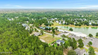 9500 195 Fallen Pear Lane NE, Leland, NC 28451 — lot in The Bluffs on the Cape Fear, Leland, NC, photo 8 of 41: 26_DJI_20260923162544_0861_D