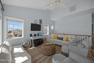 3936 Island Drive, North Topsail Beach, NC 28460 – photo 4: 3936 Island Drive family room couch