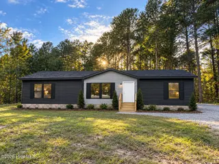 459 Orchard Lane SE, Bolivia, NC 28422 — 4-bedroom manufactured home in Vineyard Landing, Bolivia, NC, photo 1 of 4: Front