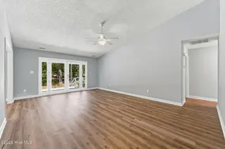 1122 Barkentine Drive, New Bern, NC 28560 – photo 12: Vaulted ceiling - access to deck