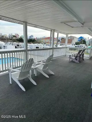 303 Henderson Boulevard 14, Atlantic Beach, NC 28512 – photo 12: deck with view of pool