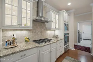 214 Fayemarsh Road, Wilmington, NC 28412 — 3-bedroom home in Village at Motts Landing, Wilmington, NC, photo 17 of 49: Fayemarsh214-5kitShaneL33A0072-CR2 copy