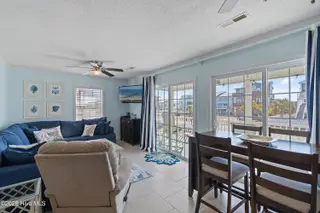 316 E Dolphin Drive, Oak Island, NC 28465 – photo 10: 316EDolphinDr - 17