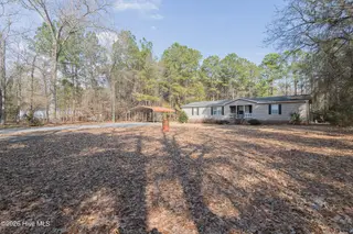 210 Creek Bank Drive, New Bern, NC 28560 — 3-bedroom manufactured home in Creekwater Haven, New Bern, NC, photo 7 of 58: Front