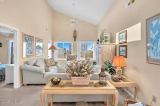 1708 W Beach Drive, Oak Island, NC 28465 – photo 7: 06-Final 1708 W Beach Dr OKI-RJREM-1811
