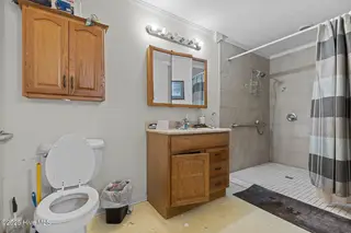 712 Page Drive, Jacksonville, NC 28540 — 4-bedroom home in Northwoods, Jacksonville, NC, photo 9 of 18: Primary Bath