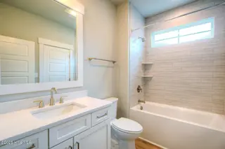 170 NE 31st Street, Oak Island, NC 28465 – photo 23: 170 NE 31st St Oak Island NC-large-028-0