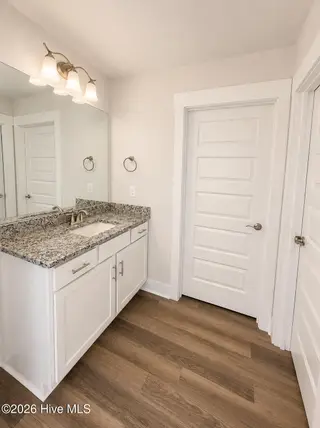 8635 Blue Haw Way Lot 130, Leland, NC 28451 — 5-bedroom home in Indigo Preserve, Leland, NC, photo 15 of 33: Primary Bath