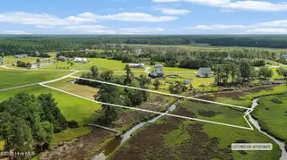 303 Orchard Circle, Newport, NC 28570 – photo 1: Lot with dock in Chadwick Shores