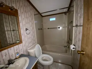 231 NE 67th Street, Oak Island, NC 28465 – photo 14: IMG_5909