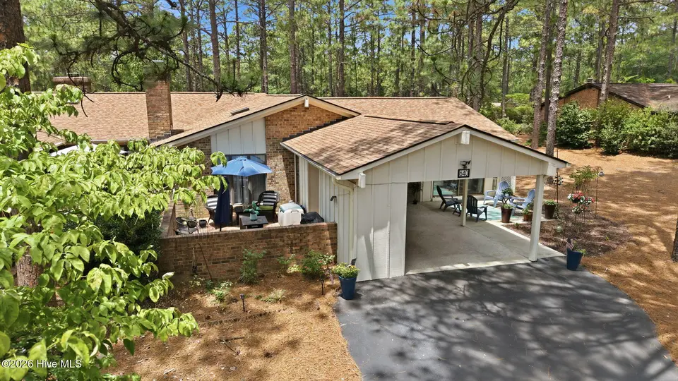 640 Redwood Drive, Southern Pines, NC 28387 – photo 1 of 51: 3-web-or-mls-DJI_20260624124651_0330_D