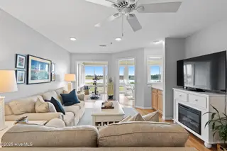 1916 Inlet Village Circle SW Unit 3a, Ocean Isle Beach, NC 28469 — 2-bedroom condo in Inlet Wacche, Ocean Isle Beach, NC, photo 12 of 38: Living room